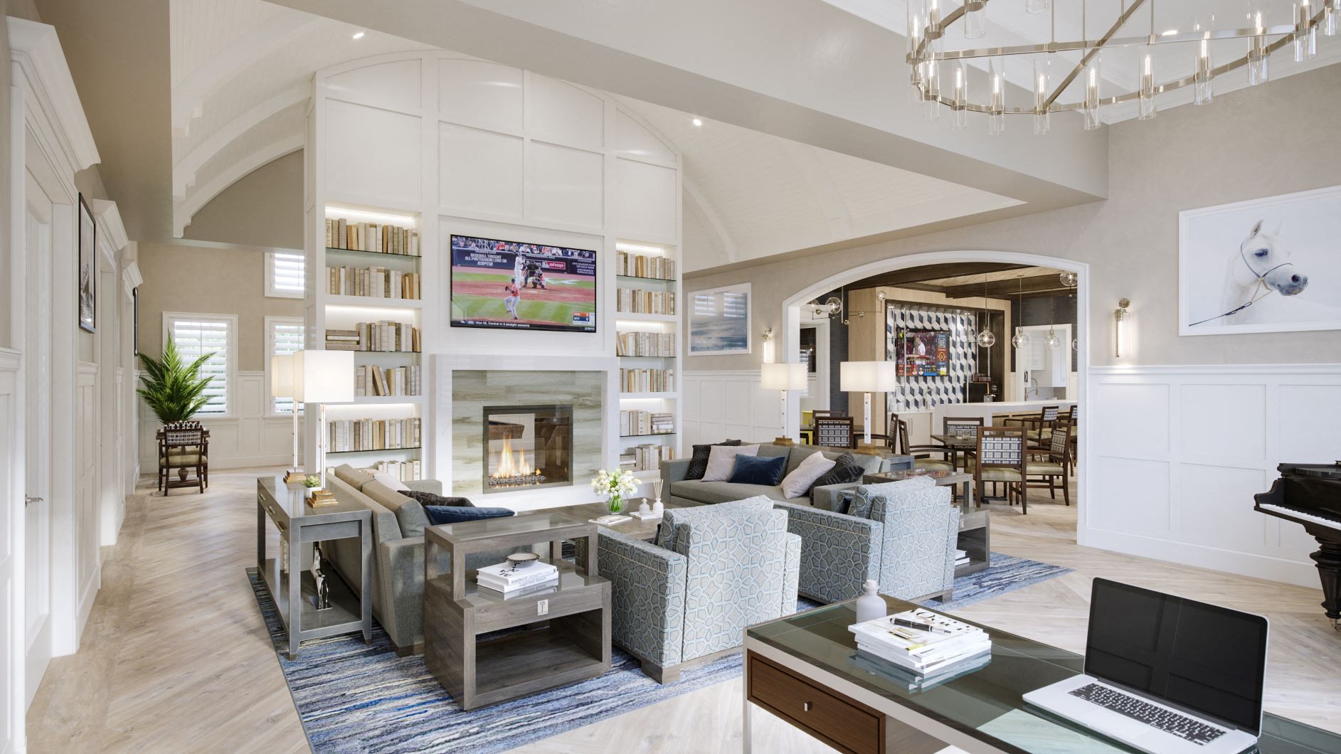 a living room with couches and chairs and a fireplace